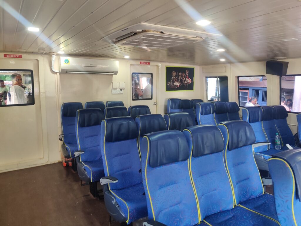 Inside view of the air-conditioned cabin on the Vega Boat in Alappuzha